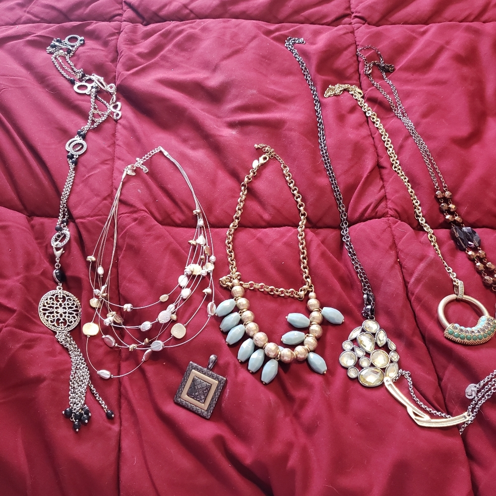 7 Lia Sophia necklaces plus pendant.